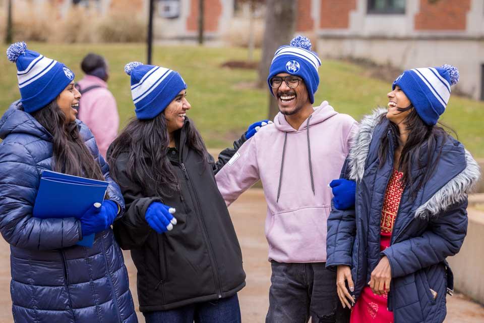 Students outside on campus during international students orientation 